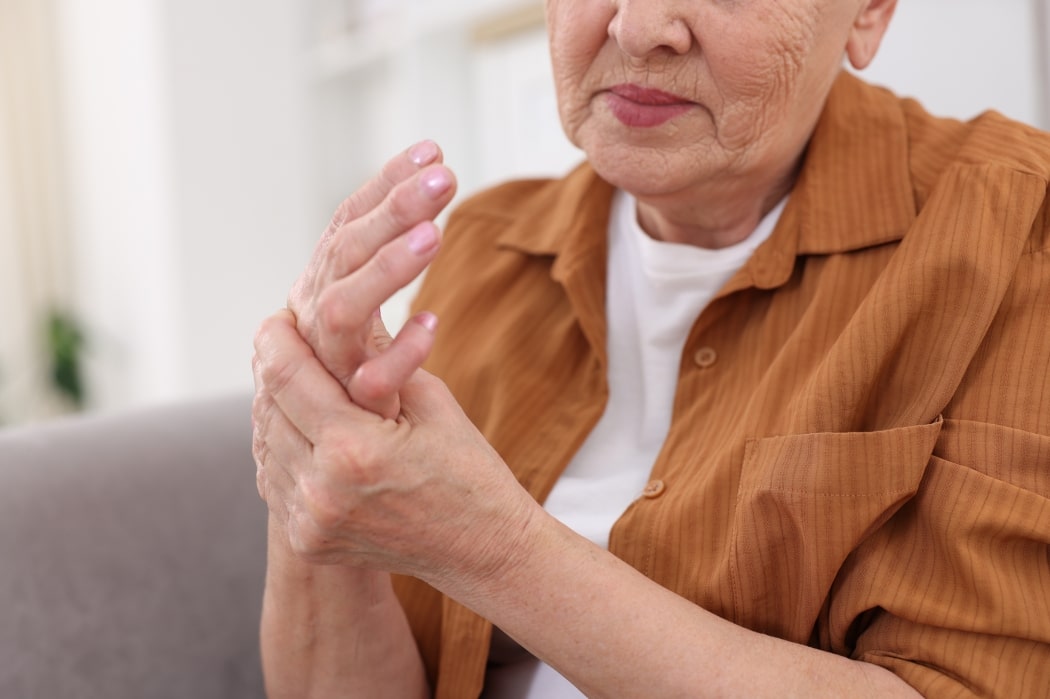 An elderly women suffers from nerve pain